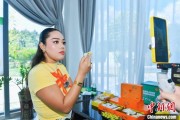 六爻教程泰国主播品三亚榴莲：“尝到了家乡味”